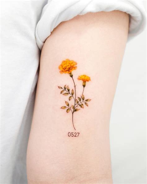october birth flower tattoo ideas cosmos marigolds  tattoos