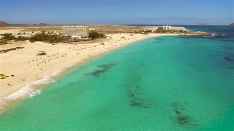 Aerial View Of Corralejos Big Beaches With Turquoise Sea In