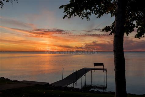 Sunset Over A Pier On Green Bay Stock Photo Image Of Beautiful Green