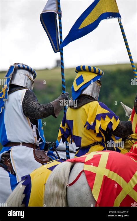 Medieval Knights On Horseback Holding Lance During Reenactment