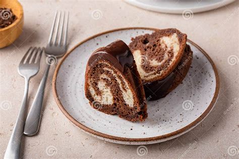 Marbled Bundt Cake Sliced On A Plate Chocolate And Vanilla Marble Cake With Chocolate Glaze