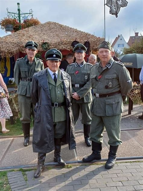 Historian blasts men dressed as Nazi SS as 'flabby 'Allo 'Allo wannabes ...