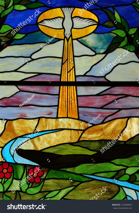 Stained Glass Window Depicting Holy Spirit In Form Of A Dove Hovering