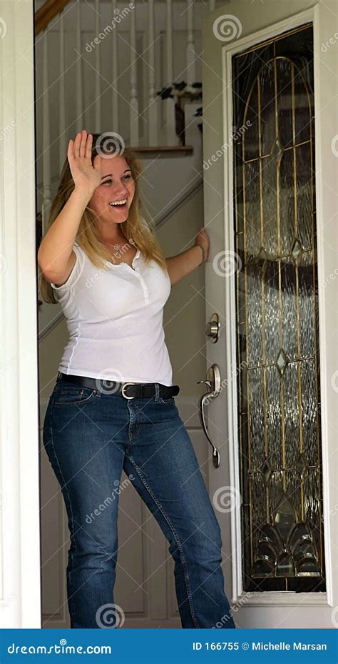 Young Woman Waving At Front Door Royalty Free Stock Photo Image 166755