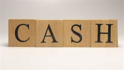 The Name Cash Was Created From Wooden Letter Cubes Stock Photo Image