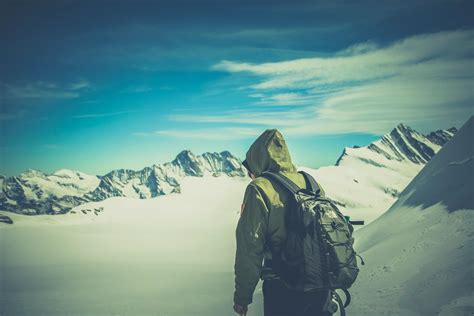 man  woman hiking  mountain  stock photo