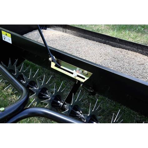 Brinly Capacity Spike Aerator Drop Tow Behind Spreader In The Tow