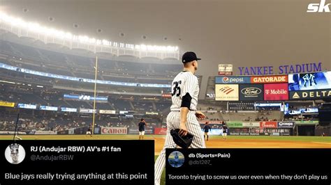 New York Yankees Fans React To Smoke From Canadian Wildfires Shrouding Yankee Stadium Toronto