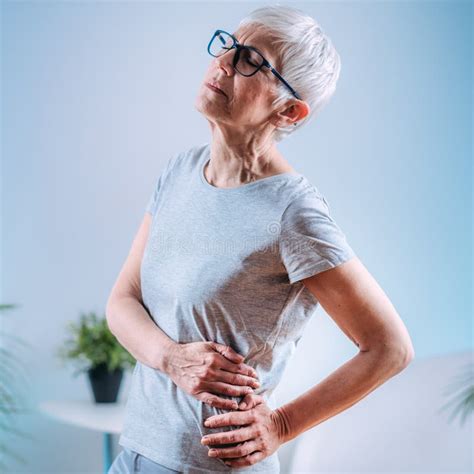 Pain In Lower Back Sciatica Nerve Pain Stock Image Image Of Woman