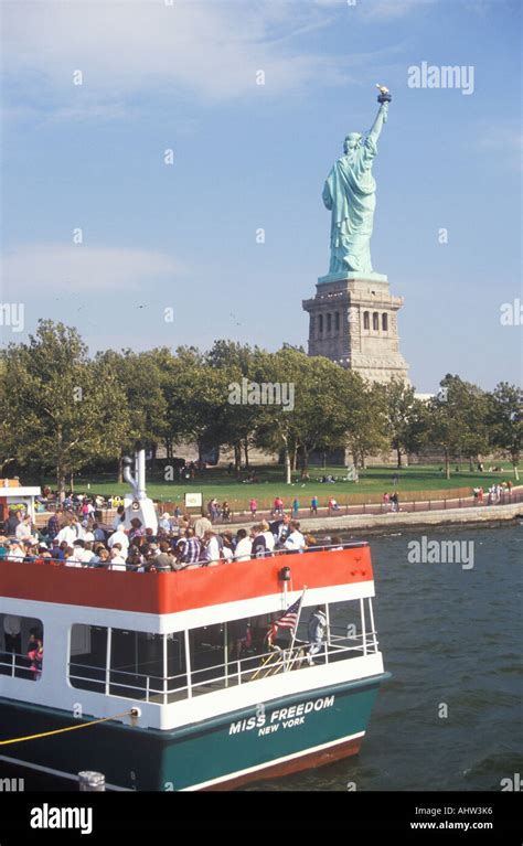 Circle Line Boat at the Statue of Liberty New York City New York Stock ...