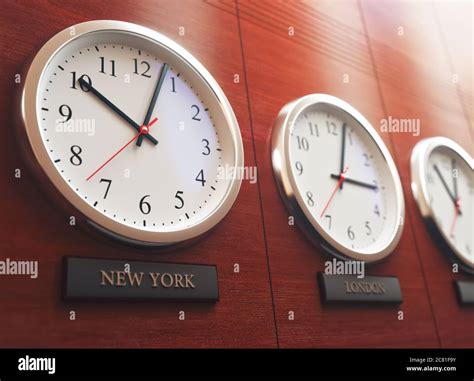 World wide time zone clock. Clocks on the wall, showing the time around the world Stock Photo ...