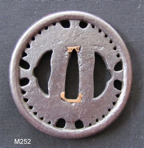 M252. Bold Tokei Tsuba with Hozon Paper – Japanese sword books and tsuba