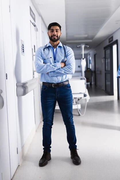 Premium Photo Portrait Of Happy Biracial Male Doctor With Stethoscope