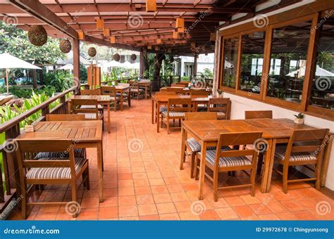 Outdoor Restaurant Interiour With Wooden Floor And Furniture Stock