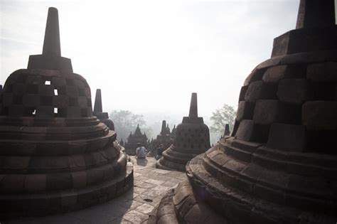 Premium Photo | Stupas at borobudur temple against sky