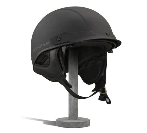 A Black Helmet Is Mounted On A Metal Stand