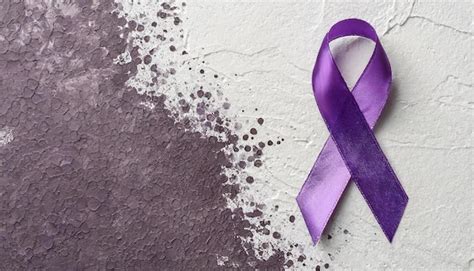 Premium Photo Purple Satin Awareness Ribbon Isolated On Putty