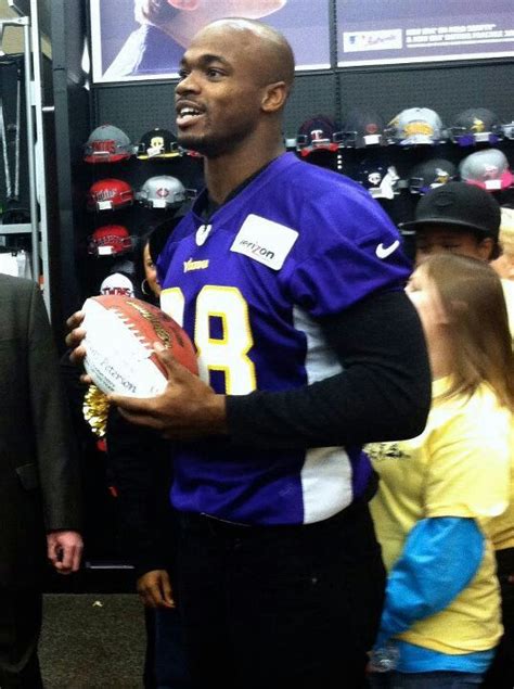 Adrian Peterson Minnesota Vikings 2012 community man of the year Curtis ...