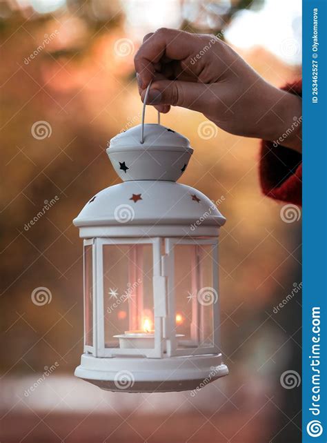 Hand Holds A Lantern In The Forest Arm Holding The Vintage Lamp With A