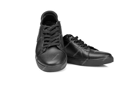 Premium Photo Black Leather Sneakers On A White Background Closeup