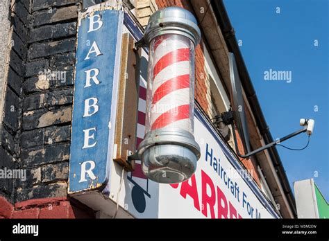 Traditional Red And White Barbers Pole Outside Men S Hairdressers Stock