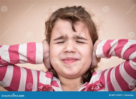 Young Girl Covering Her Ears Stock Image Image Of Behavior Girl