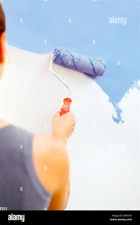 Woman Painting Wall Paint Brush Hi Res Stock Photography And Images Alamy