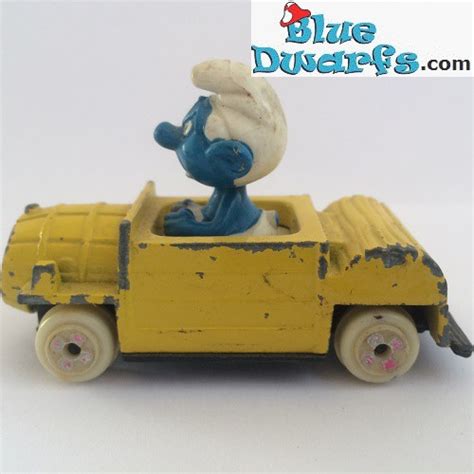 Angry smurf in yellow car ESCI (blue smurf, G)