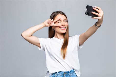 Free Photo Portrait Of A Young Attractive Woman Making Selfie Photo