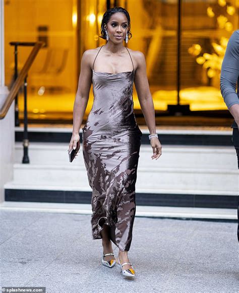 Kelly Rowland Suffers A Wardrobe Malfunction In Her Slinky Brown Dress