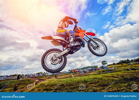 Dirt Bike Extreme Jump On Motocross Sunset Stock Photo Image Of Biker