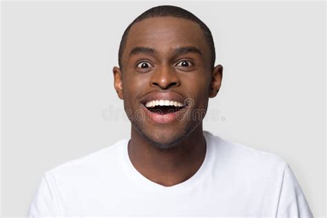 Head Shot Portrait Of Happy Excited African American Man Stock Image