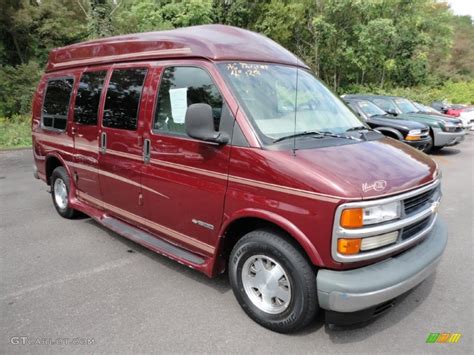 Dark Carmine Red Metallic 1999 Chevrolet Express 1500 Passenger Conversion Van Exterior Photo