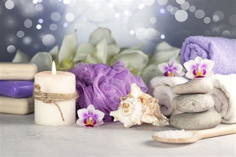 Massage Stones Seashell Burning Candles Rolled Towels Soap Massage Oil Sea Salt Flowers