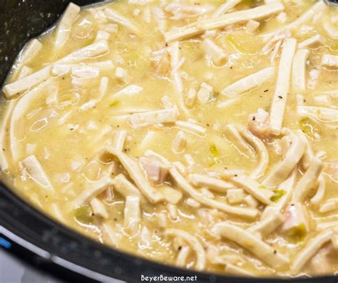 Easy Crock Pot Chicken And Noodles Is Made By Slow Cooking Chicken