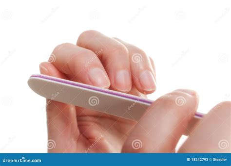 Woman Filing Her Nails Stock Photos - Image: 18242793