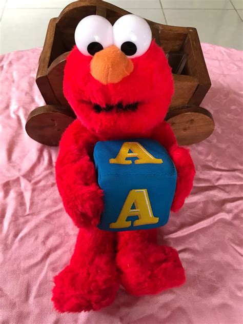 Elmo plush, Hobbies & Toys, Toys & Games on Carousell