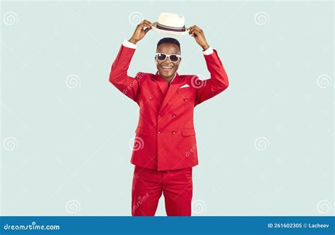 Happy African American Man In Trendy Red Suit And Sunglasses Smiles And