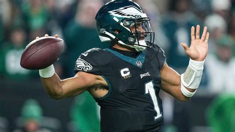 Eagles' Jalen Hurts sets NFL record for rushing touchdowns by a QB in a ...