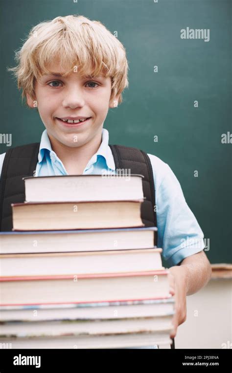 Portrait Schoolboy Carrying Books Class Hi Res Stock Photography And