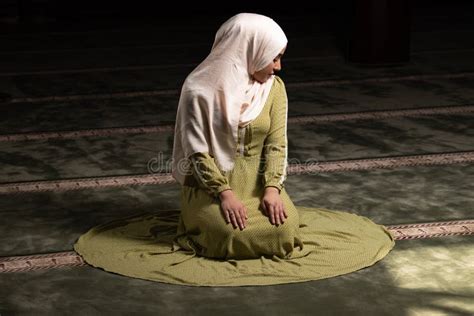 Woman In Hijab Sitting In Mosque And Praying Stock Image Image Of