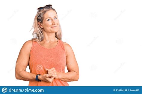 Middle Age Fit Blonde Woman Wearing Casual Summer Clothes And