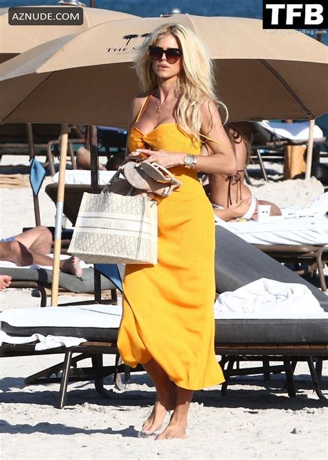 Victoria Silvstedt Lounges Beachside In Miami In An Orange Two Piece Bikini AZNude