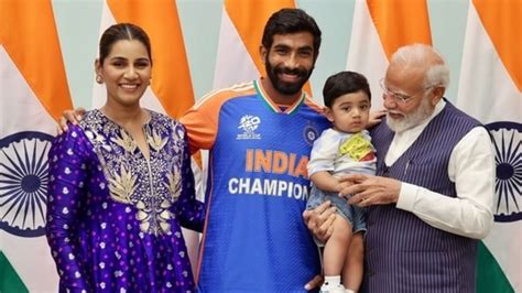 Pm Modi Cradles Jasprit Bumrah And Sanjana Ganesans Son Angad In