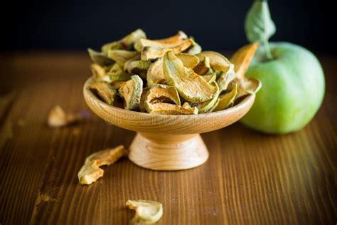 Dried Apples In A Bowl With A Fresh Apple Stock Image Image Of Fresh