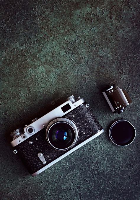 Download Disassembled Photography Camera Top View Wallpaper | Wallpapers.com