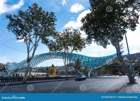 Tbilisi Georgia 05 10 2022 The Bridge Of Peace Is A Bow Shaped Pedestrian Bridge Over