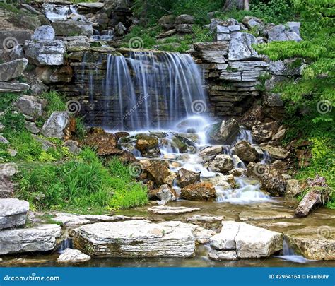 Waterfall in Forest Park stock photo. Image of ripples - 42964164