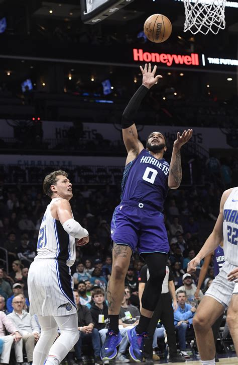 Balanced Scoring Carries Magic Over Hornets Reuters