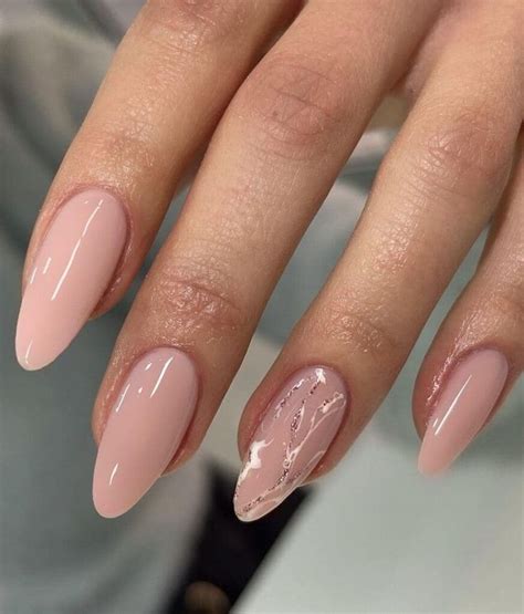 Almond Shaped Nude Nails With A Glitter Accent Casual Nails Trendy